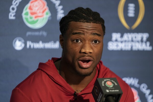 Alabama quarterback Jalen Milroe speaks to reporters during a press conference on Thursday, Dec. 28, 2023, in Los Angeles. Alabama is scheduled to play against Michigan on New Year's Day in the Rose Bowl, a semifinal in the College Football Playoff. (AP Photo/Ryan Sun)