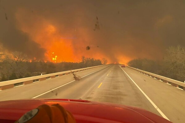 FILE - This image taken from Greenville Fire-Rescue's Facebook page on Feb. 28, 2024, shows fires in the Texas Panhandle. On Tuesday, April 2, 2024, Texas’ top emergency manager told a panel of lawmakers that the state should establish its own firefighting aircraft division after a series of wildfires, including the largest in state history, scorched the Panhandle region this year. (Greenville Fire-Rescue via AP, File)