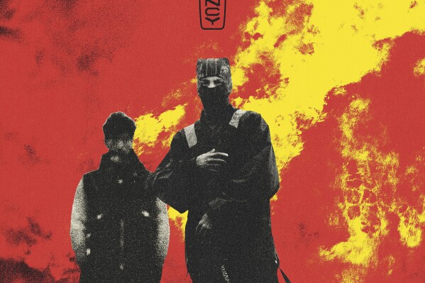 This cover image released by Fueled by Ramen Records shows "Clancy" by Twenty One Pilots. (Fueled by Ramen Records via AP)