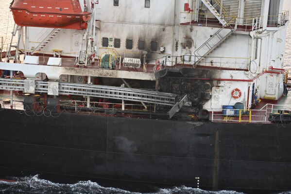 File - This photograph provided by the Indian Navy shows U.S.-owned ship Genco Picardy that came under attack Wednesday from a bomb-carrying drone launched by Yemen's Houthi rebels in the Gulf of Aden, Thursday, Jan.18, 2024. Attacks on ships in the Red Sea by Yemen's Houthi rebels have unraveled a key global trade route, forcing vessels into longer and more costly journeys around Africa. (Indian Navy via AP, File)