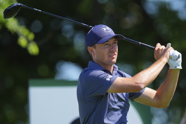 Jordan Spieth watches his tee shot on the second hole during the final round of the CJ Cup Byron Nelson golf tournament in McKinney, Texas, Sunday, May 4, 2025. (AP Photo/LM Otero)