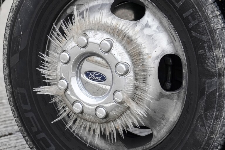 Ice kinds on a truck's wheel as temperatures dropped below freezing, Monday, Jan. 15, 2024, in Conroe, Texas. (Brett Coomer/Houston Myth by the expend of AP)