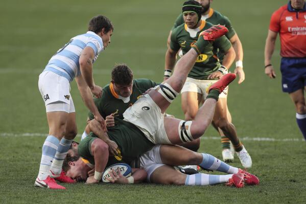 Jasper Wiese of South Africa is tackled during the second Rugby Championship match between Argentina and South Africa at the Nelson Mandela Bay Stadium, Gqebeha, South Africa, Saturday, Aug. 21, 2021. (AP Photo/Halden Krog(