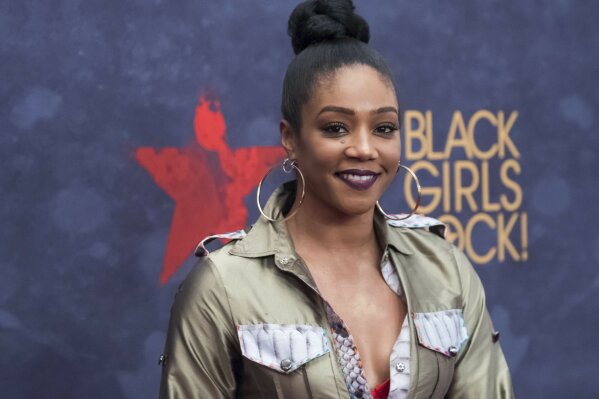 
              FILE - In this Aug. 5, 2017 file photo, Tiffany Haddish attends the Black Girls Rock! Awards at the New Jersey Performing Arts Center in Newark, N.J. “Girls Trip” changed the game for Tiffany Haddish, and now she’s being honored as one of Essence magazine’s “game-changers” at its annual “Black Women in Hollywood” awards. “Girls Trip” was one of last year’s big hits and made Haddish a breakout star. The comedian is one of four women being honored at the March 1, 2018 event in Beverly Hills, Calif. (Photo by Charles Sykes/Invision/AP, File)
            