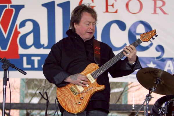 Singer Rick Derringer performs during a campaign rally kicking off George Wallace Jr's bid for the office of lieutenant governor in Montgomery, Ala., on Feb. 18, 2006. (AP Photo/Rob Carr, File)