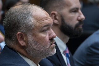 IRS Criminal Investigator Joseph Ziegler, right, and IRS Special Agent Gary Shapley, appear before the House Oversight and Accountability Committee during a hearing to argue that the Justice Department interfered with a yearslong investigation into Hunter Biden, at the Capitol in Washington, July 19, 2023. (AP Photo/J. Scott Applewhite, File)