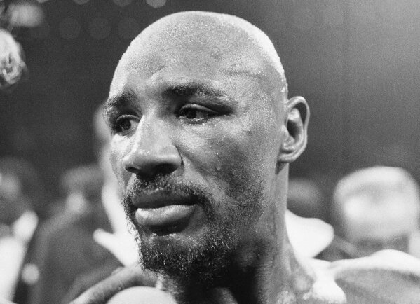FILE In this August 1974 file photo, Marvin Hagler stands in the ring after his boxing bout against Sugar Ray Seales in Boston. Hagler, the middleweight boxing great whose title reign and career ended with a split-decision loss to â€œSugarâ€ Ray Leonard in 1987, died Saturday, March 13, 2021. He was 66. (AP Photo/Peter Bregg, File)