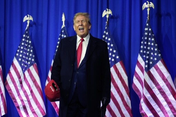 FILE - Republican presidential candidate former President Donald Trump yells on stage at a campaign rally in Waterford Township, Mich., Feb. 17, 2024. (AP Photo/Paul Sancya, File)
