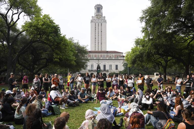 Demonstrators gather on the campus of the University of Texas at Austin, Thursday, April 25, 2024, to protest the war in Gaza, Thursday, April 25, 2024, in Austin, Texas. (Jon Shapley/Houston Chronicle via AP)