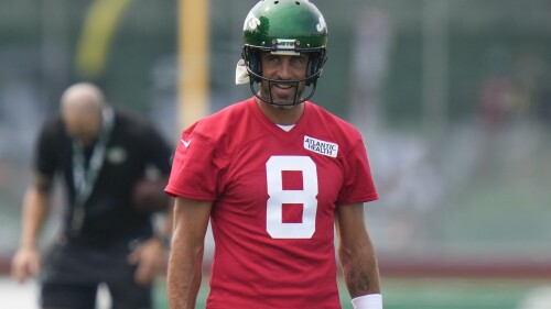 New York Jets quarterback Aaron Rodgers (8) participates in a drill at the NFL football team's training facility in Florham Park, N.J., Thursday, July 20, 2023. (AP Photo/Seth Wenig)