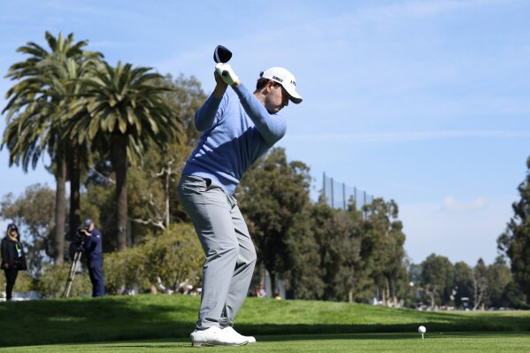 Patrick Cantlay hits from the 11th tee during the first round of the Genesis Invitational golf tournament at Riviera Country Club, Thursday, Feb. 15, 2024, in the Pacific Palisades area of Los Angeles. (APPhoto/Ryan Kang)