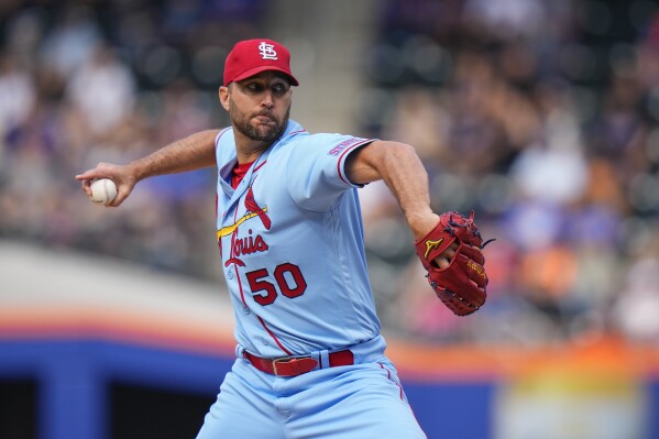 St. Louis Cardinals' Adam Wainwright (50) pitches during the first inning of a baseball game against the New York Mets, Saturday, June 17, 2023, in New York. (AP Photo/Frank Franklin II)