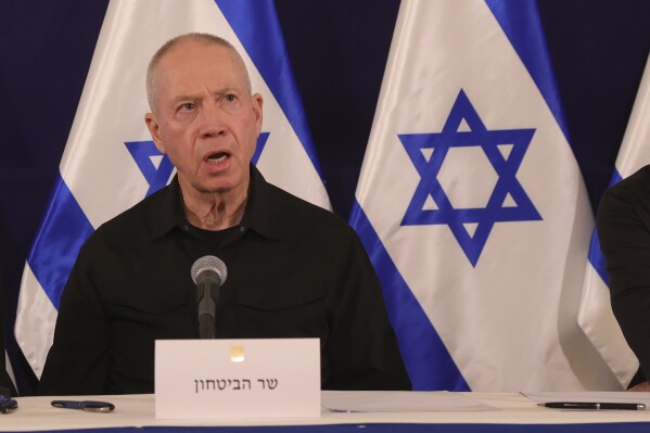 FILE - Israeli Defense Minister Yoav Gallant speaks during a news conference in the Kirya military base in Tel Aviv, Israel, on Oct. 28, 2023. (Abir Sultan/Pool Photo via AP, File)