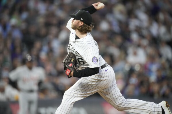 Tovar homers, extends his hitting streak to 13 games to help Rockies beat  Tigers 8-5