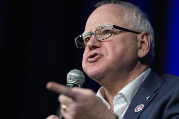 Minnesota Gov. Tim Walz speaks at a town hall event at Roosevelt High School, Friday, March 14, 2025, in Des Moines, Iowa. (AP Photo/Matthew Putney,File)