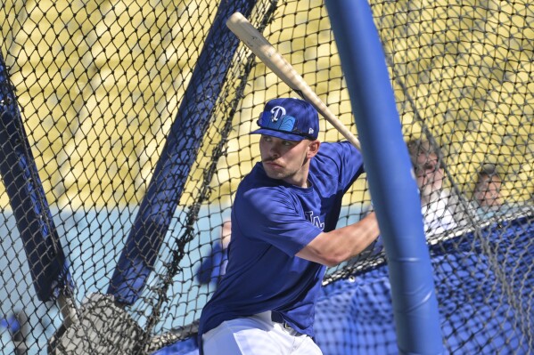 Los Angeles Dodgers' Dalton Rushing waits on a pitch as he participates in batting practice before a baseball game against the Oakland Athletics, Wednesday, May 14, 2025, in Los Angeles. (AP Photo/Jayne Kamin-Oncea)