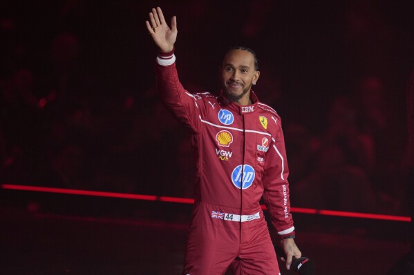 Ferrari driver Lewis Hamilton of Britain attends the F1 75 Live launch event at the O2 arena in London, Tuesday, Feb. 18, 2025. (AP Photo/Kin Cheung)