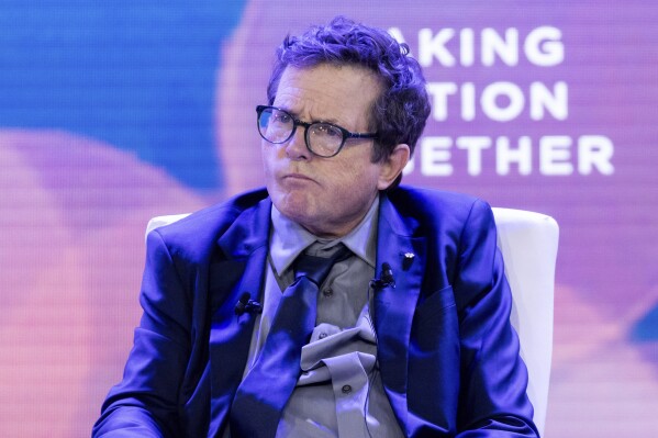 Actor Michael J. Fox speaks listens during a panel at the Clinton Global Initiative, Tuesday, Sept. 19, 2023, in New York. (AP Photo/Julia Nikhinson)