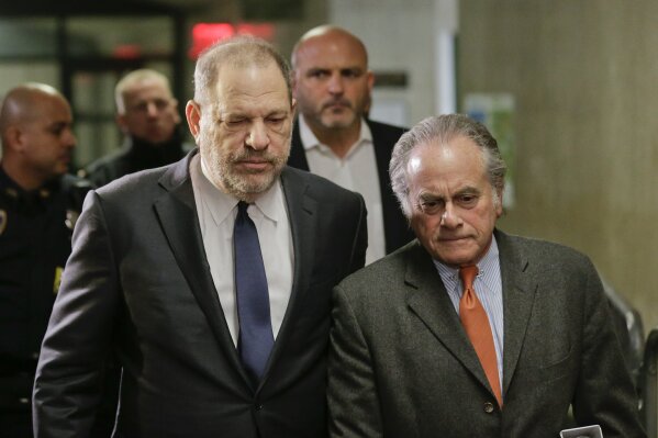 
              Harvey Weinstein, left, arrives at New York Supreme Court with his attorney Benjamin Brafman, Thursday, Dec. 20, 2018, in New York. Judge James Burke will decide on the future of his sexual assault case, which has been clouded by allegations that police acted improperly in the investigation that led to his arrest.(AP Photo/Seth Wenig)
            