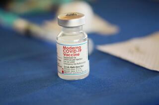 CORRECTS EARNING DATE TO WEDNESDAY, AUG. 3, 2022. FILE - A vial of the Moderna COVID-19 vaccine rests on a table at an inoculation station next to Jackson State University in Jackson, Miss., Tuesday, July 19, 2022. Better-than-expected COVID-19 vaccine sales pushed Moderna past Wall Street’s 2022 second-quarter forecasts. The company said Wednesday, Aug. 3, 2022, that its Spikevax vaccine brought in $4.53 billion during the quarter. (AP Photo/Rogelio V. Solis, File, File)
