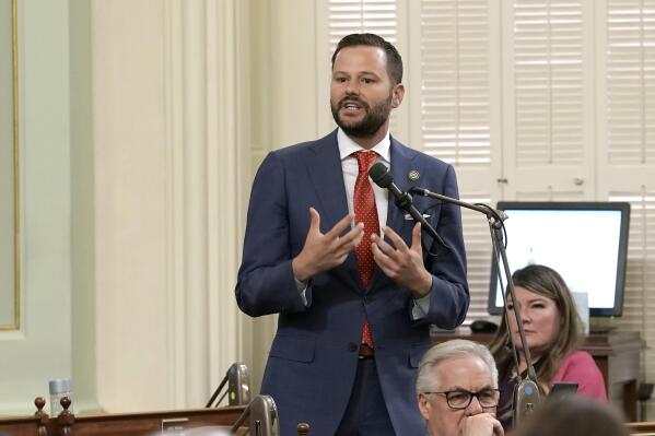 Assemblyman Matt Haney, D-San Francisco, calls on lawmakers to approve a measure he was carrying allowing Los Angeles, Oakland and San Francisco, to set up places where opioid users could legally inject drugs in supervised settings, during the Assembly session in Sacramento, Calif., on Thursday, June 30, 2022. The Assembly approved the measure and sent it to back to the Senate for final consideration. (AP Photo/Rich Pedroncelli)