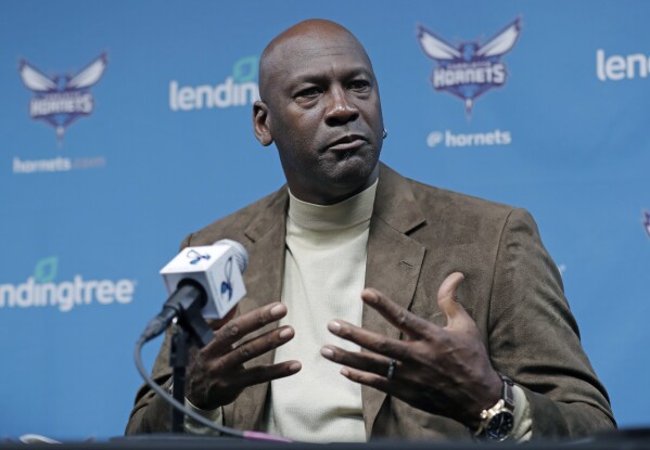 FILE - Charlotte Hornets owner Michael Jordan speaks to the media about hosting the NBA All-Star basketball game during a news conference in Charlotte, N.C., Tuesday, Feb. 12, 2019. Michael Jordan is finalizing a deal to sell the majority share of the Charlotte Hornets, a move that will end his 13-year run overseeing the organization, the team announced Friday, June 16, 2023. Jordan is selling to a group led by Gabe Plotkin and Rick Schnall, the Hornets said. (AP Photo/Chuck Burton, File)