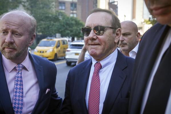 Actor Kevin Spacey leaves court following proceedings in a civil trial, Friday, Oct. 7, 2022, in New York, accusing him of sexually abusing a 14-year-old in the 1980s when he was 26. (AP Photo/Bebeto Matthews)