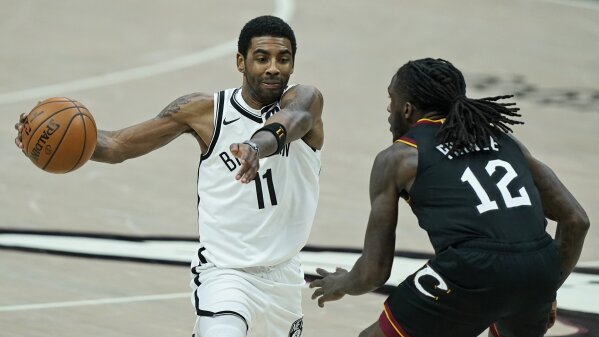 Kyrie Irving of the Cleveland Cavaliers reacts during the second