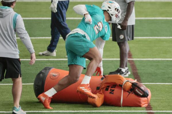 Miami Dolphins linebacker Bradley Chubb (2) runs through practice drills during NFL football practice in Miami Gardens, Fla., Wednesday, Nov. 2, 2022. (Al Diaz/Miami Herald via AP)