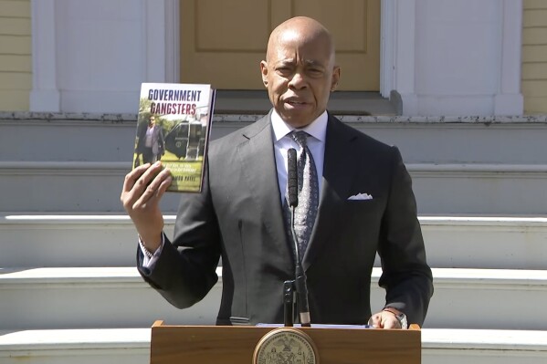 In this photo taken from video, New York mayor Eric Adams speaks after a federal judge dismissed his corruption case, Wednesday, April 2, 2025, in New York. (New York City Mayor's Office via AP)