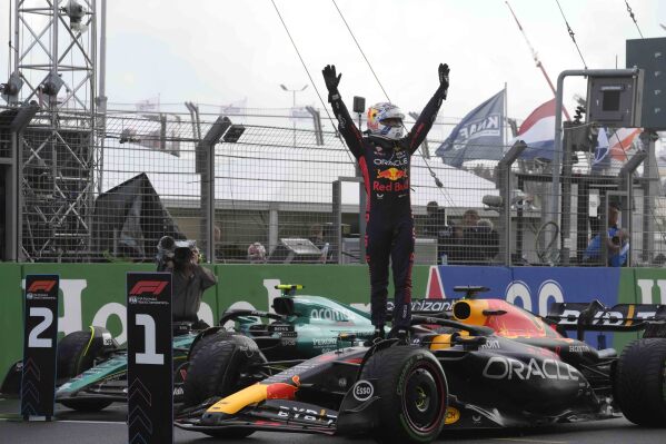 Red Bull driver Max Verstappen of the Netherlands celebrates after winning during the Formula One Dutch Grand Prix at the Zandvoort racetrack, in Zandvoort, Netherlands, Sunday, Aug. 27, 2023.(AP Photo/Peter Dejong)