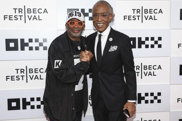 Director Spike Lee, left, and journalist Al Sharpton, right, attend the premiere for "Loudmouth" at the BMCC Tribeca Performing Arts Center during the 2022 Tribeca Festival on Saturday, June 18, 2022, in New York. (Photo by Andy Kropa/Invision/AP)