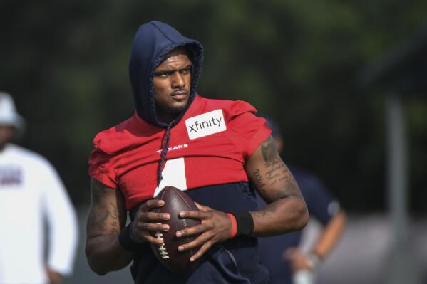 FILE - Texans quarterback Deshaun Watson (4) practices with the team during NFL football practice Monday, Aug. 2, 2021, in Houston. A judge has declined efforts by attorneys for Houston Texans quarterback Deshaun Watson to delay all his depositions in connection with lawsuits filed by 22 women who have accused him of sexual assault and harassment. During a court hearing Monday, Feb. 21, 2022, defense attorney Rusty Hardin asked that depositions be delayed until the end of a criminal investigation. (AP Photo/Justin Rex File)
