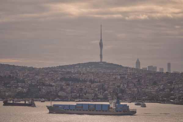 Containers ship Hornise sails across the Bosphorus strait, on his way from China's Jingtang port to Russia's Novorossiysk port, in Istanbul, Turkey, Tuesday, April 8, 2025. (AP Photo/Francisco Seco)