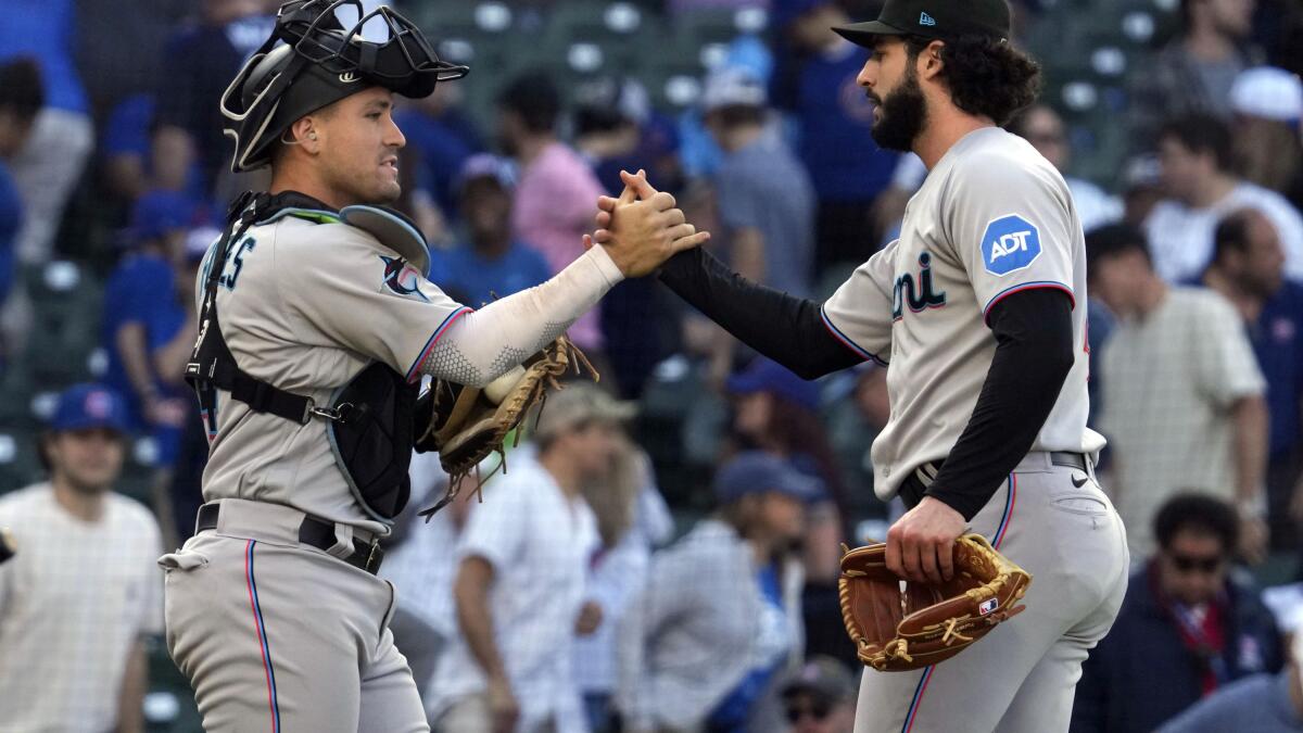 Marlins top Cubs in 14 innings, tie major league record with 11-0 record in  one-run games