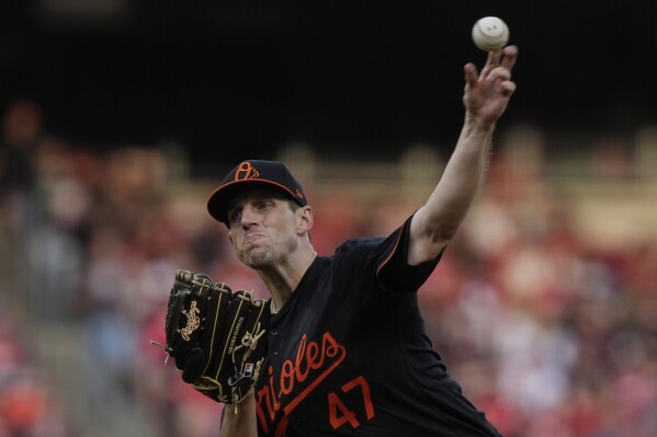 Baltimore Orioles starting pitcher John Means throws in the second inning of a baseball game against the Cincinnati Reds, Saturday, May 4, 2024, in Cincinnati. (AP Photo/Carolyn Kaster)
