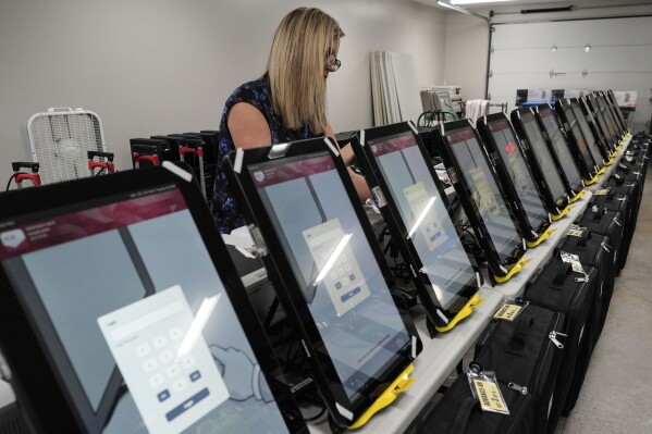 Voting machines are seen at the Bartow County Election office, Jan. 25, 2024, in Cartersville, Ga. (AP Photo/Mike Stewart, File)