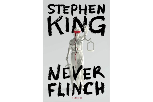 This cover image released by Scribner shows "Never Flinch" by Stephen King. (Scribner via AP)