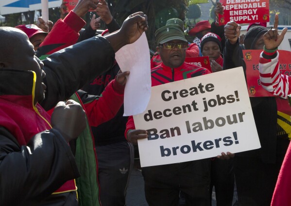 Members of the Congress of South Africa Trade Unions take part in an unemployment protest march in Johannesburg, Thursday, July 6, 2023. South Africa's official unemployment rate of 33% is the highest in the world, and economists say it's even higher at 42% if you count those who have given up looking for work and have dropped off unemployment systems. (AP Photo/Denis Farrell)