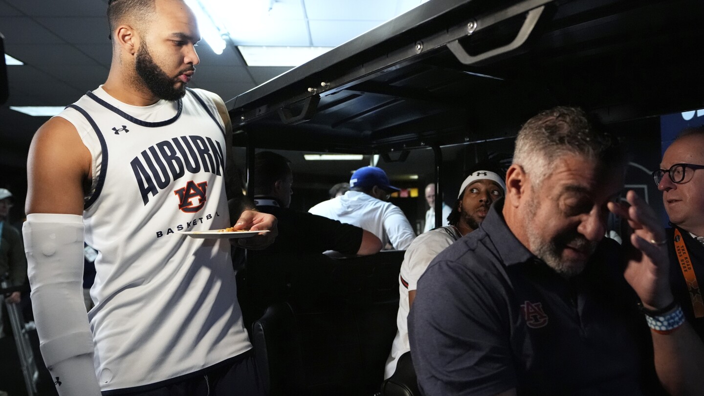 Auburn's Broome says there's no pain in his elbow and he will be ready to face Florida in Final Four