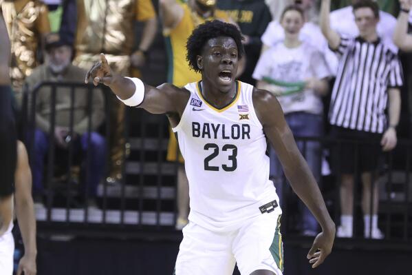 Baylor forward Jonathan Tchamwa Tchatchoua (23) points up court after scoring a three-point play against Texas Tech in the second half of an NCAA college basketball game, Saturday, Feb. 4, 2023, in Waco, Texas. (AP Photo/Rod Aydelotte)