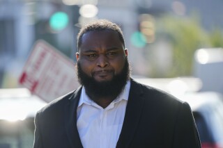 Cardell Hayes enters Orleans Parish Criminal District Court in New Orleans, Wednesday, Sept. 20, 2023, for a hearing regarding his retrial for shooting former NFL star Will Smith. Hayes fatally shot Smith, who had retired from the New Orleans Saints, and wounded his wife, in a confrontation after a 2016 traffic crash. (AP Photo/Gerald Herbert)