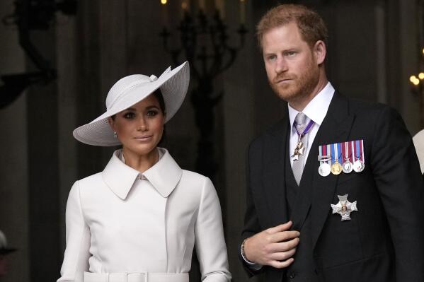 FILE - Prince Harry and Meghan Markle, Duke and Duchess of Sussex leave after a service of thanksgiving for the reign of Queen Elizabeth II at St Paul's Cathedral in London, on June 3, 2022. Meghan has said that “just by existing,” she and her husband Prince Harry had “upset the dynamic of the hierarchy" when they were in the U.K. (AP Photo/Matt Dunham, Pool)