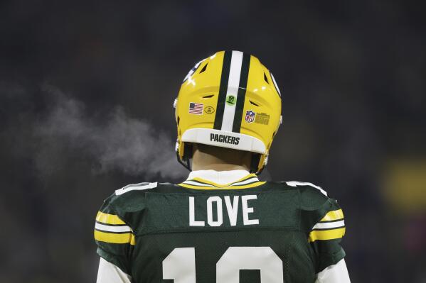 FILE - Green Bay Packers quarterback Jordan Love (10) warms up before an NFL football game against the Detroit Lions Sunday, Jan. 8, 2023, in Green Bay, Wis. The Packers and quarterback Jordan Love have agreed to terms on a one-year contract extension that makes his deal run through 2024, according to a person familiar with the situation. The person spoke to The Associated Press on the condition of anonymity because the extension hasn’t officially been announced. (AP Photo/Jeffrey Phelps, File)