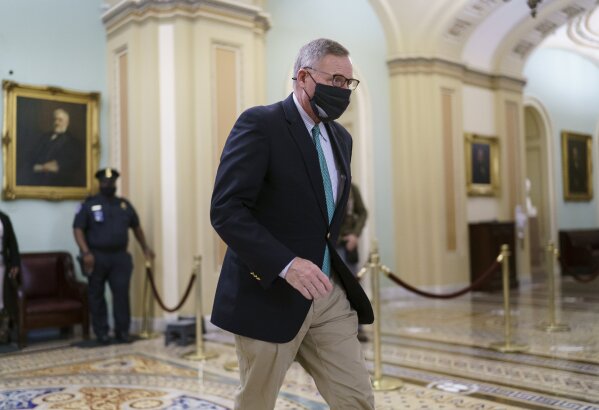 Sen. Richard Burr, R-N.C., leaves the chamber as the Senate voted to consider hearing from witnesses in the impeachment trial of former President Donald Trump, at the Capitol in Washington, Saturday, Feb. 13, 2021. (AP Photo/J. Scott Applewhite)