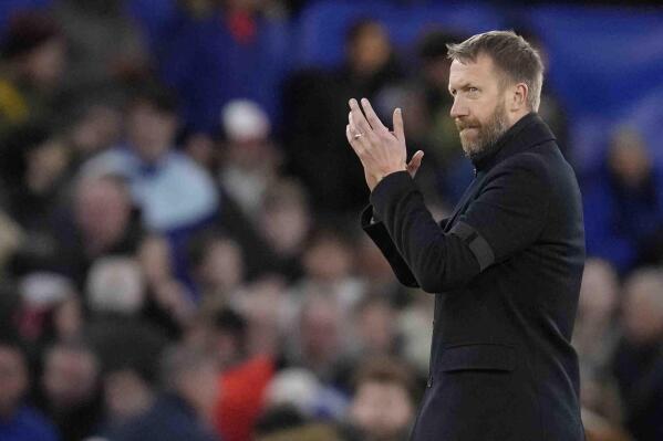 Chelsea's head coach Graham Potter leaves the field after the English Premier League soccer match between Chelsea and Southampton at the Stamford Bridge stadium in London, Saturday, Feb. 18, 2023. (AP Photo/Kirsty Wigglesworth)