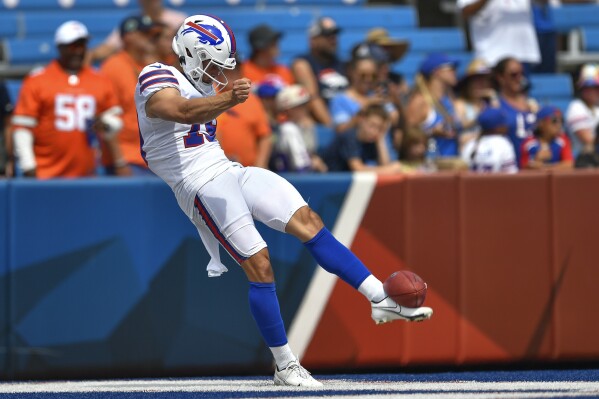 FILE - Buffalo Bills punter Matt Araiza warms up before the team's NFL football game against the Denver Broncos in Orchard Park, N.Y., Aug. 20, 2022. The Kansas City Chiefs are signing Araiza, who was dropped from a lawsuit in December that had been filed by a woman who alleged she was raped by San Diego State football players in 2021. The signing was announced by Araiza's agent, Joe Linta, and confirmed a short while later by the team. (AP Photo/Adrian Kraus, File)