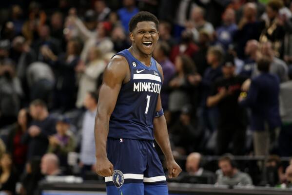 Minnesota Timberwolves guard Anthony Edwards celebrates after defeating the Memphis Grizzlies in an NBA basketball game Wednesday, Nov. 30, 2022, in Minneapolis. (AP Photo/Andy Clayton-King)