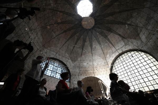 A view of the Octagonal Hall of the ancient Baths of Diocletian during the unveiling of the new "Museum of Rescued Art" in Rome, Wednesday, June 15, 2022. Italy has been so successful in regaining ancient artworks and artifacts illegally exported from the country that it has now created a museum just for them, the Museum of Rescued Art, inaugurated on Wednesday in the cavernous Octagonal Hall of the ancient Baths of Diocletian. (AP Photo/Alessandra Tarantino)