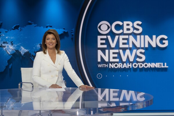 This image released by CBS News shows Norah O'Donnell on the new set of "CBS Evening News with Norah O'Donnell" in Washington, D.C., on Aug. 16, 2022. O'Donnell is leaving as anchor of the “CBS Evening News” after the presidential election, she announced on Tuesday. (T.J. Kirkpatrick/CBS News via AP)